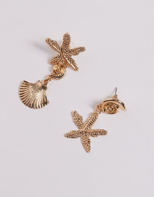 Kaiia – Exklusiv – Asymmetrische Ohrringe in Gold mit Seestern- und Muschel-Design, 2 von 3