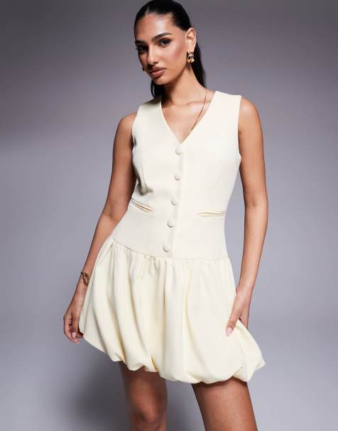Kaiia Exklusiv – Elegantes ärmelloses Minikleid in Buttermilchgelb mit Knopfleiste und Ballonsaum - view 1