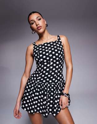 Kaiia Exklusiv - Hochgeschlossenes Satin-Minikleid in Schwarz mit weißen Punkten, eckigem Ausschnitt, Knopfleiste und ge...