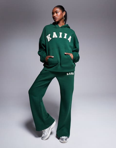 Kaiia - Felpa con cappuccio oversize, T-shirt ristretta, joggers a fondo ampio, verde bosco con logo ricamato in coordinato - view 1