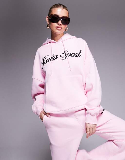 Kaiia - Felpa con cappuccio sportiva rosa con logo ricamato nero in coordinato