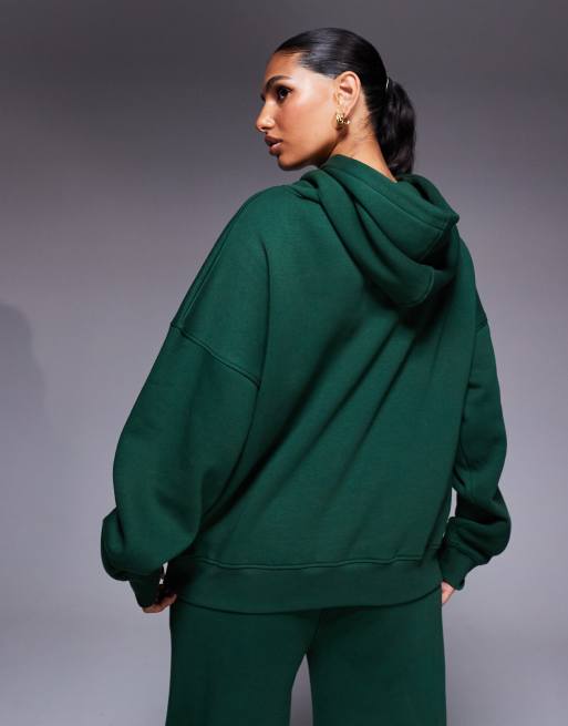Kaiia - Felpa con cappuccio verde bosco in misto cotone oversize con logo ricamato in coordinato  , 2 di 4