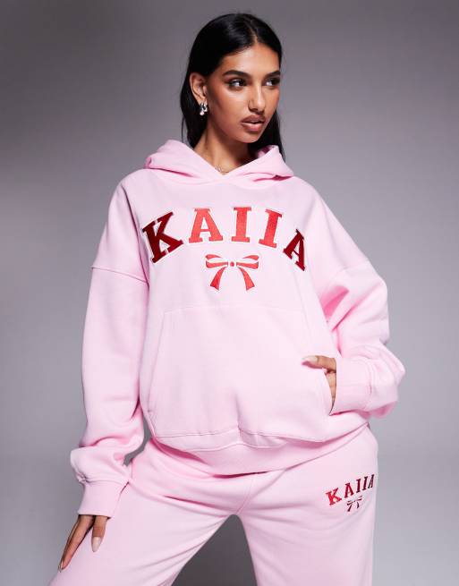 Kaiia - Felpa oversize color rosa e rosso con cappuccio e logo con fiocco ricamato in coordinato