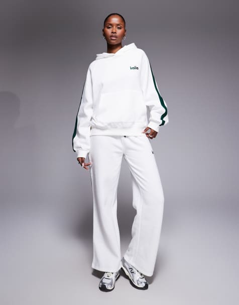 Kaiia - Felpa oversize con cappuccio e riga laterale e joggers a fondo ampio bianchi e verde scuro in coordinato - view 1
