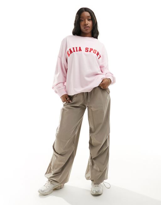 Kaiia Felpa rosa chiaro con logo sportivo ASOS