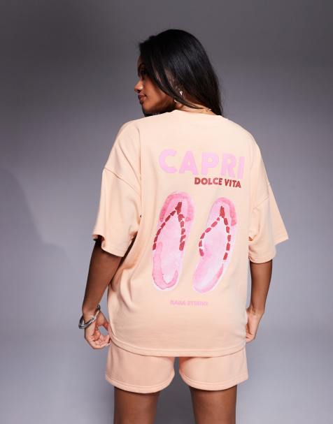 Kaiia - Ferskenfarvet oversized T-shirt i bomuldsrigt materiale med Capri- og klipklappereprint på ryggen - view 1