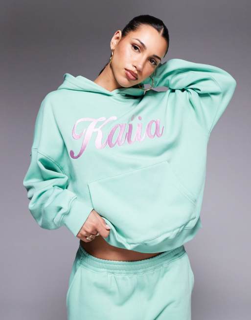 Kaiia – Grön och rosa huvtröja i oversize med broderad logga, del av set