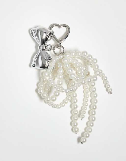 Kaiia heart carabiner pearl and chrome bow bag charm in silver
