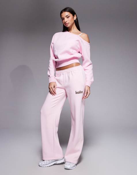 Kaiia - Joggers a fondo ampio color rosa confetto in misto cotone con logo e stella con stampa animalier in coordinato - view 1