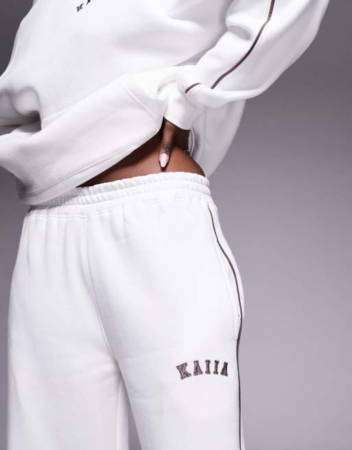 Kaiia - Joggers a fondo ampio in misto cotone bianchi con logo ricamato e riga laterale in coordinato  , 2 di 5