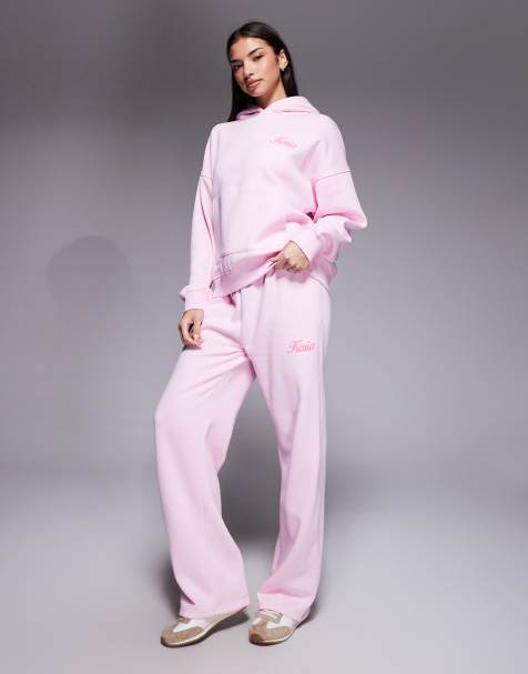 Kaiia - Joggers a fondo ampio in misto cotone color rosa confetto e corallo con stampa del logo in rilievo in coordinato - view 1