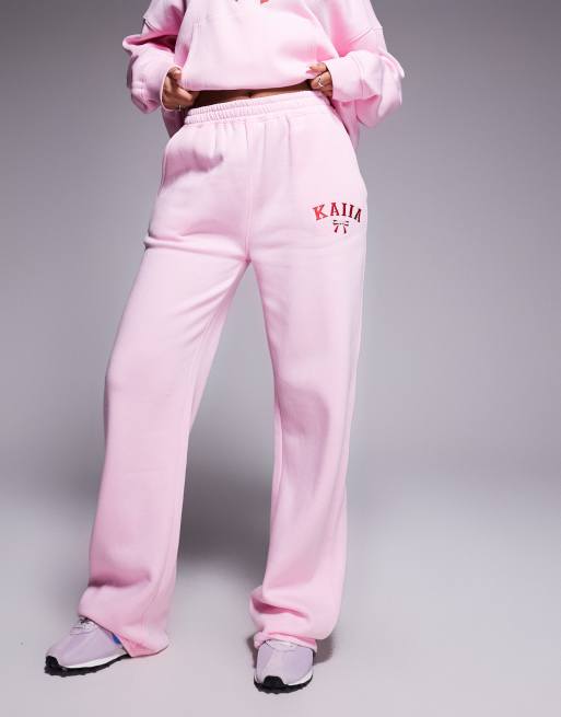 Kaiia - Joggers a fondo ampio rosa e rossi in misto cotone con logo e fiocco ricamati in coordinato  , 2 di 5
