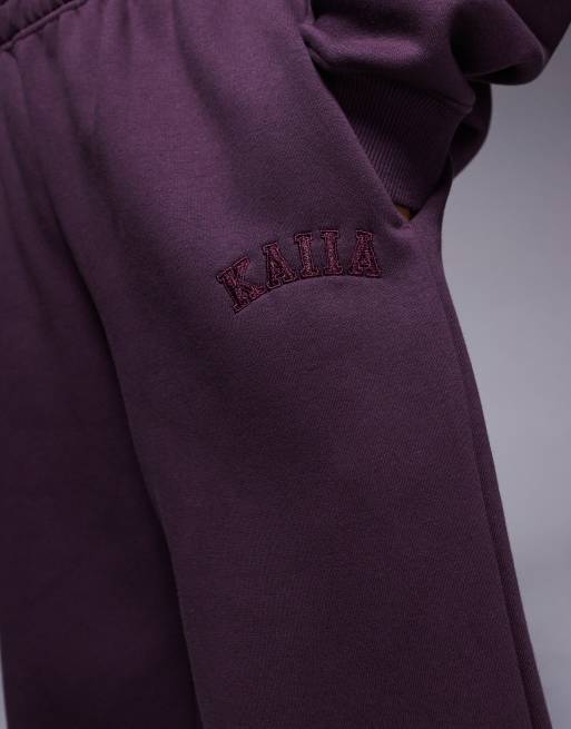 Kaiia - Joggers a fondo ampio viola profondo in misto cotone con logo ricamato in coordinato  , 3 di 5