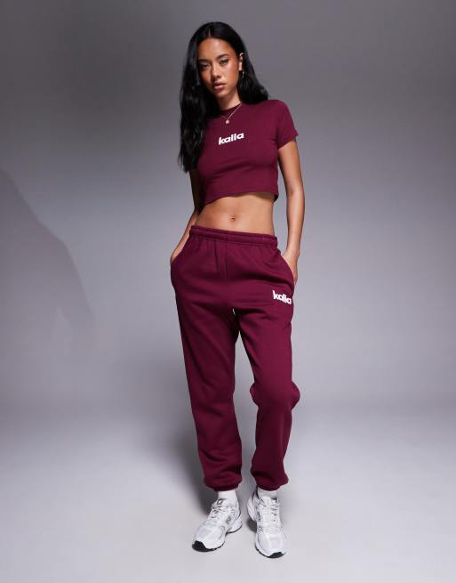Kaiia - Joggingbroek met boorden en geborduurd logo in bordeauxrood en roze