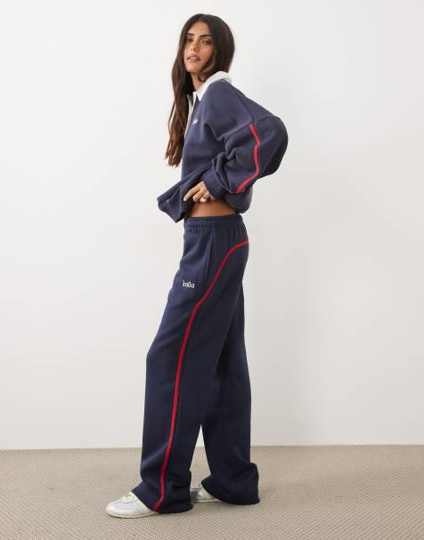 Kaiia joggingbroek met borduursel, logodetail en zijstreep, wijde pijp, co-ord in navy en rood - view 1