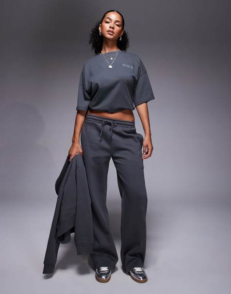 Kaiia - Joggingbroek met logo van siersteentjes en wijde pijpen in donkergrijs, deel van co-ord set - view 1