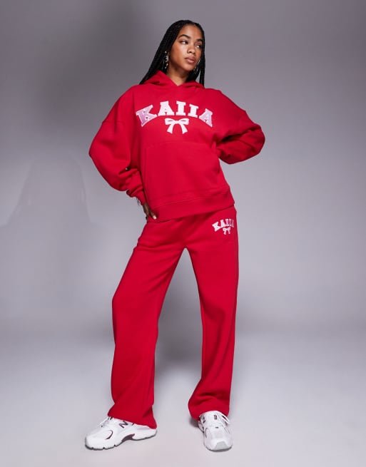 Kaiia - Joggingbroek met wijde pijpen en geborduurd striklogo in rood en roze, deel van co-ord set