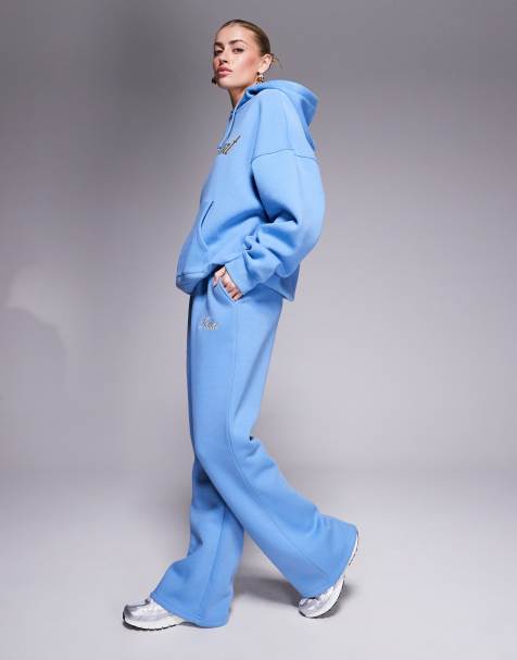 Kaiia - Joggingbroek van katoenmix met wijde pijpen en geborduurd geschreven logo in blauw en geel, deel van co-ord set - view 1