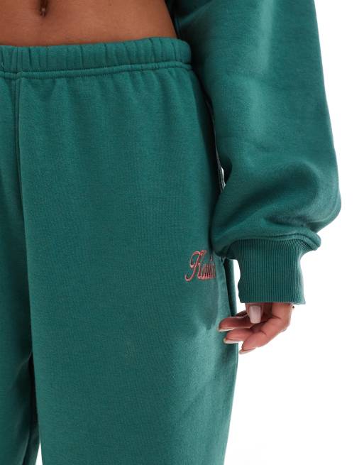 Kaiia – Jogginghose aus Baumwollmix in Dunkelgrün mit rosa Logo und Bündchen, Kombiteil  , 2 von 5