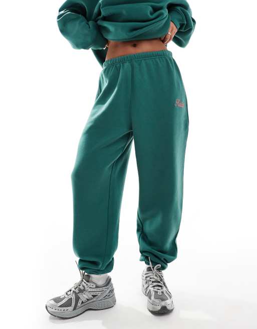 Kaiia – Jogginghose aus Baumwollmix in Dunkelgrün mit rosa Logo und Bündchen, Kombiteil  , 3 von 5