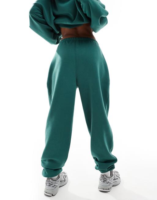 Kaiia – Jogginghose aus Baumwollmix in Dunkelgrün mit rosa Logo und Bündchen, Kombiteil  , 5 von 5