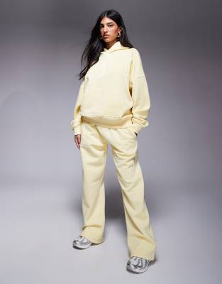Kaiia - Jogginghose aus Baumwollmix in Gelb mit „Studio"-Logo und weitem Bein, Kombiteil