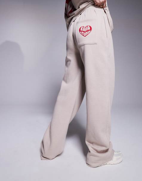 Kaiia – Jogginghose aus Baumwollmix in Steinbeige und Rot mit Tasche mit Herzmotiv hinten und Logo, Kombiteil - view 1