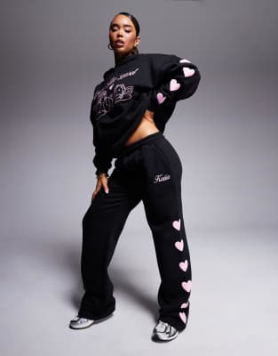 Kaiia - Jogginghose in Schwarz mit Logo und Puff-Herz-Print in Rosa und weitem Bein, Kombiteil