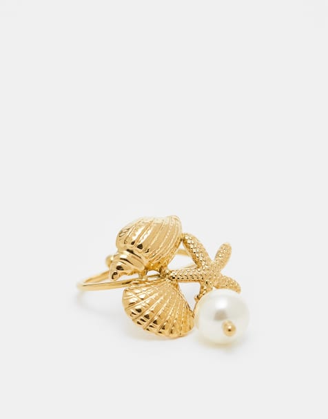 Kaiia - Justerbar og guldfarvet ring i rustfrit stål med blandet skal- og perledesign - view 1