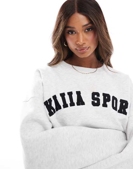Kaiia – Ljusgrå sweatshirt med logga