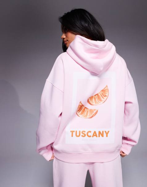 Kaiia – Ljusrosa huvtröja i bomullsmix och oversize med orange Tuscany-tryck och logga baktill, del av set - view 1