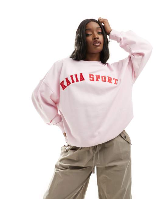 Kaiia – Ljusrosa sweatshirt med sportig logga