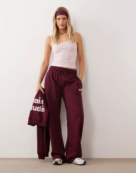 Kaiia logo ribbed waistband star pocket detail wide leg sweatpants in burgundy and pink - part of a set - view 1