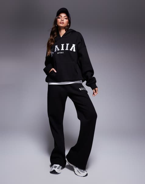 Kaiia – Mix and Match – Oversize-Kapuzenpullover, Jogginghose mit Bündchen und weitem Bein sowie Shorts in Schwarz - view 1