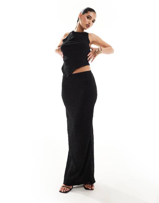 Kaiia Mouwloze top met gestrikte, open achterkant in zwart, deel