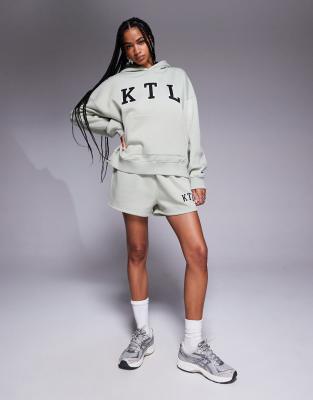 Kaiia - Oversize-Kapuzenpullover aus Baumwollmix in Salbeigrün mit „KTL"-Logo, Kombiteil