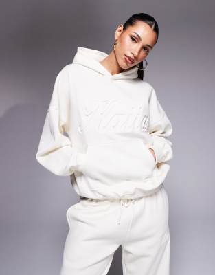 Kaiia - Oversize-Kapuzenpullover in Buttercreme mit geprägtem Schriftlogo, Kombiteil-Weiß