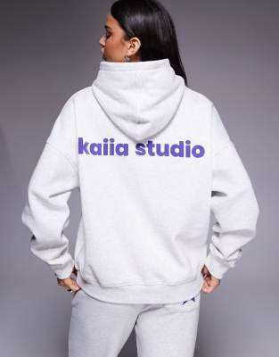 Kaiia - Oversize-Kapuzenpullover in Hellgrau meliert mit hohem Baumwollanteil und Stern-Logografik, Kombiteil