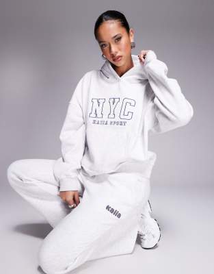 Kaiia - Oversize-Kapuzenpullover in meliertem Grau mit „NYC Sport"-Logo