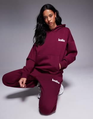 Kaiia - Oversize-Kapuzenpullover mit hohem Baumwollanteil in Burgunderrot mit Logo-Stickerei in Rosa, Kombiteil-Bunt