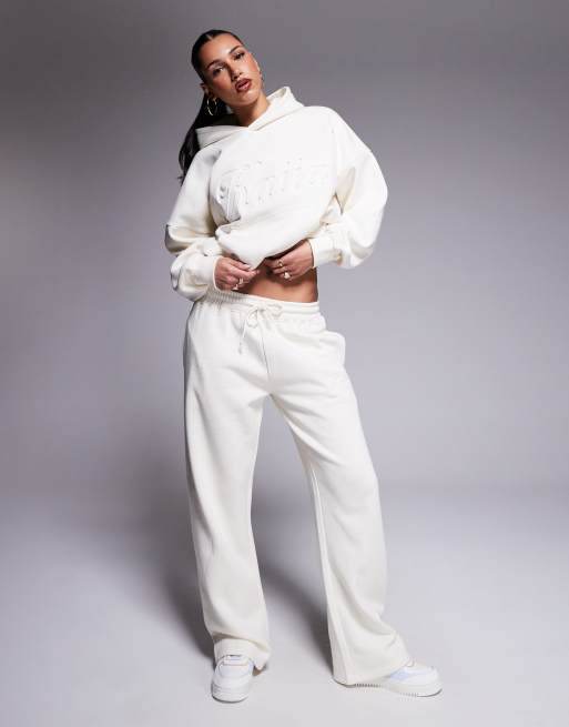 Kaiia – Oversize-Kapuzenpullover mit hohem Baumwollanteil in Buttercreme mit geprägtem Schriftlogo, Kombiteil  , 3 von 4
