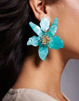 oversized diamante acrylic flower earrings in light blue