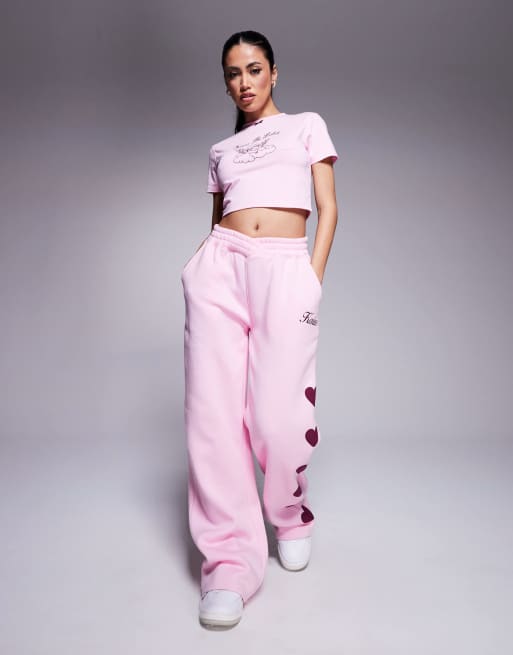 Kaiia - Pantalon de jogging d'ensemble large à taille asymétrique et détails cœurs - Rose et bordeaux