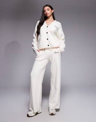 Pantalon d'ensemble ample en maille aspect laine à logo brodé - Crème-Blanc S