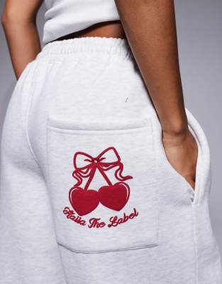 Kaiia Petite Cherry Bow Back Pocket Detail Wide Leg Sweatpants In White