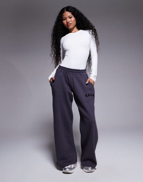 Kaiia Petite cotton blend embroidered logo wide leg sweatpants in dark gray - view 1