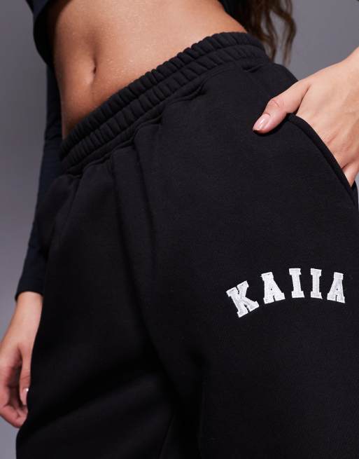 Kaiia Petite embroidered logo wide leg sweatpants in black