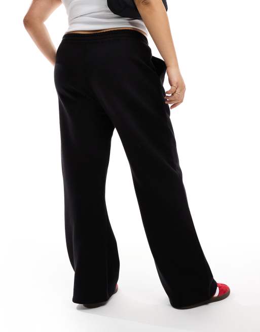 Kaiia Plus - Joggingbroek met wijde pijpen in zwart, 3 van 5