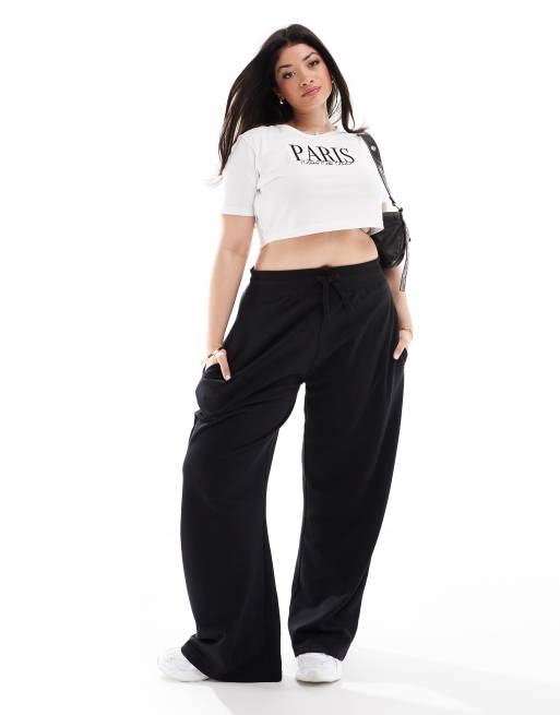 Kaiia Plus - Joggingbroek met wijde pijpen in zwart