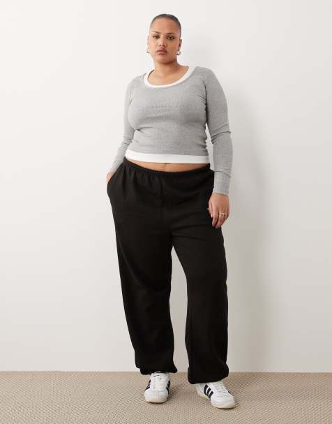 Kaiia Plus – Jogginghose aus Baumwollmix in Schwarz mit Bündchen und Logo-Stickerei, Kombiteil - view 1